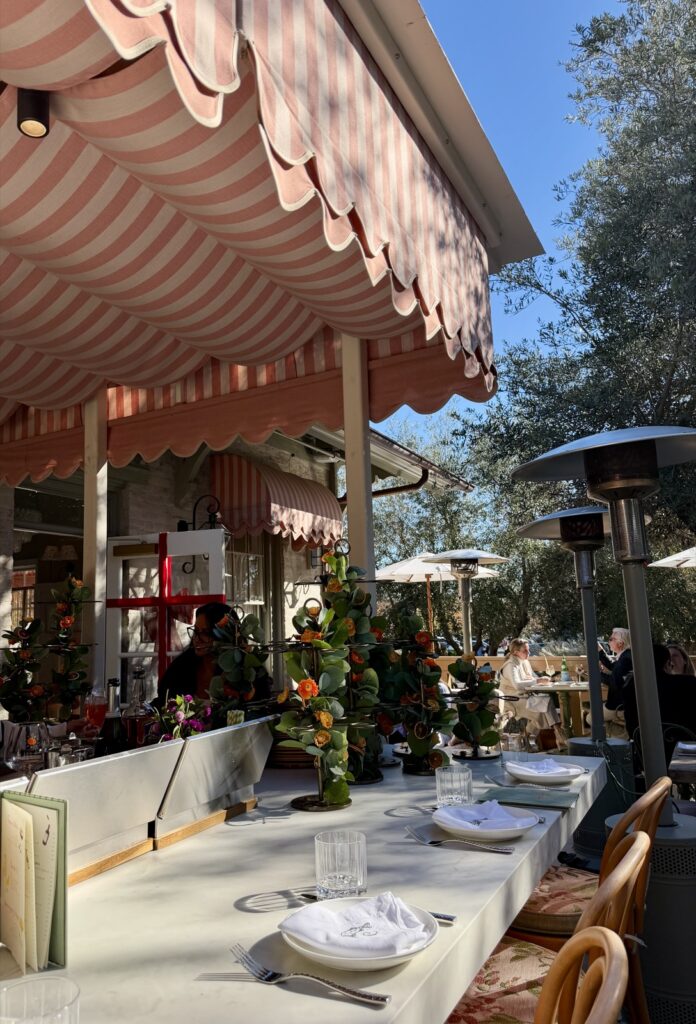Clementine restaurant bar seating with pastel canvas, canopy, two-tone, light, pink and medium pink scalloped borders
