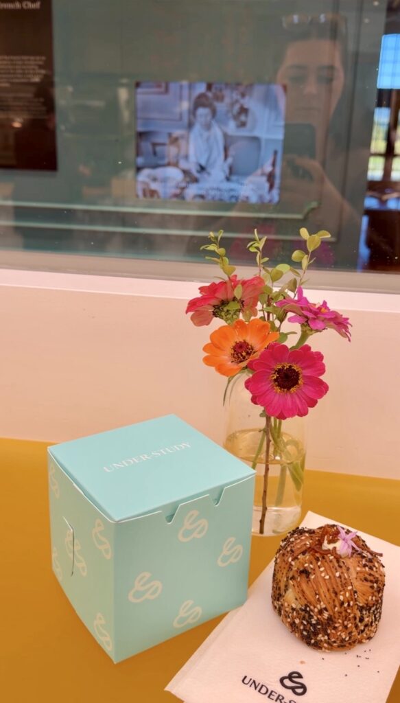 Picture of a shared wall between the MAC and Under Study in St Helena. From inside Under Study, you can see into the museum and see part of the featured display.