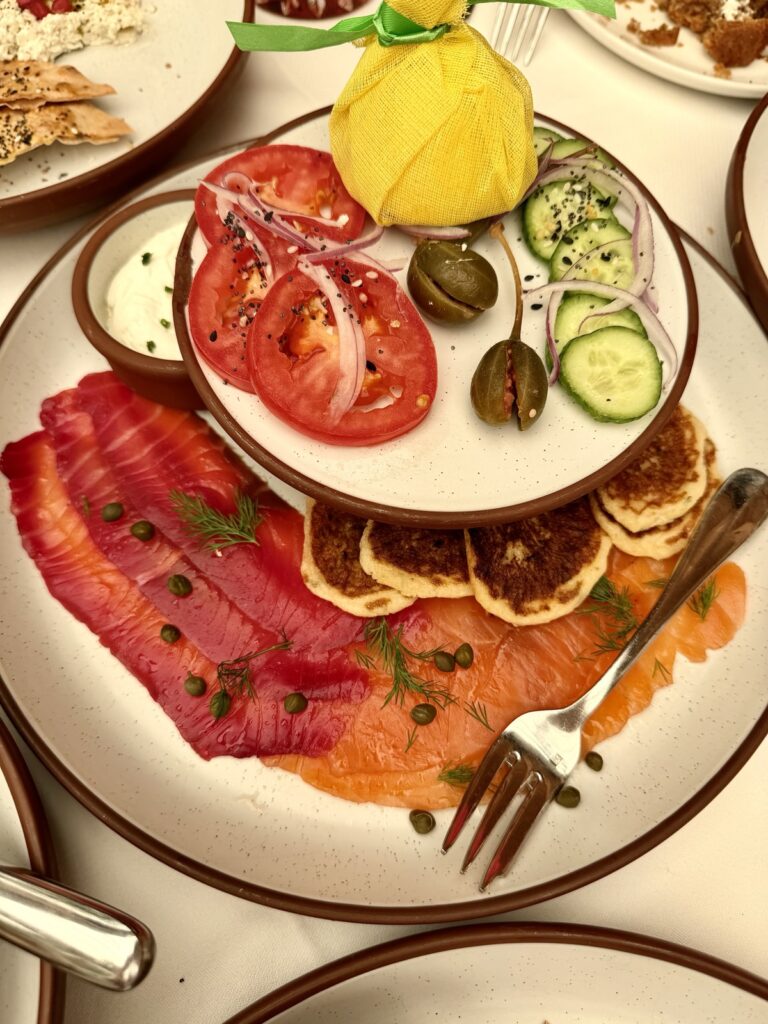 Brunch at Baltaire: a picture of gravlox, warm belinis, and chive crème fraiche