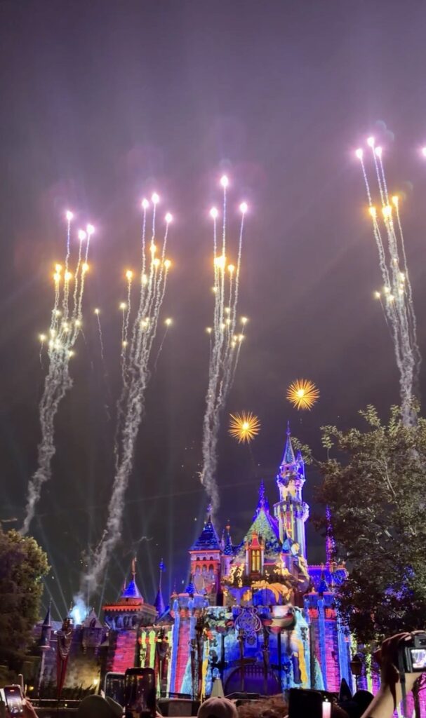 A picture of Disneyland's 70th Anniversary Wondrous Journeys Fireworks and Projection Show Castle projections.