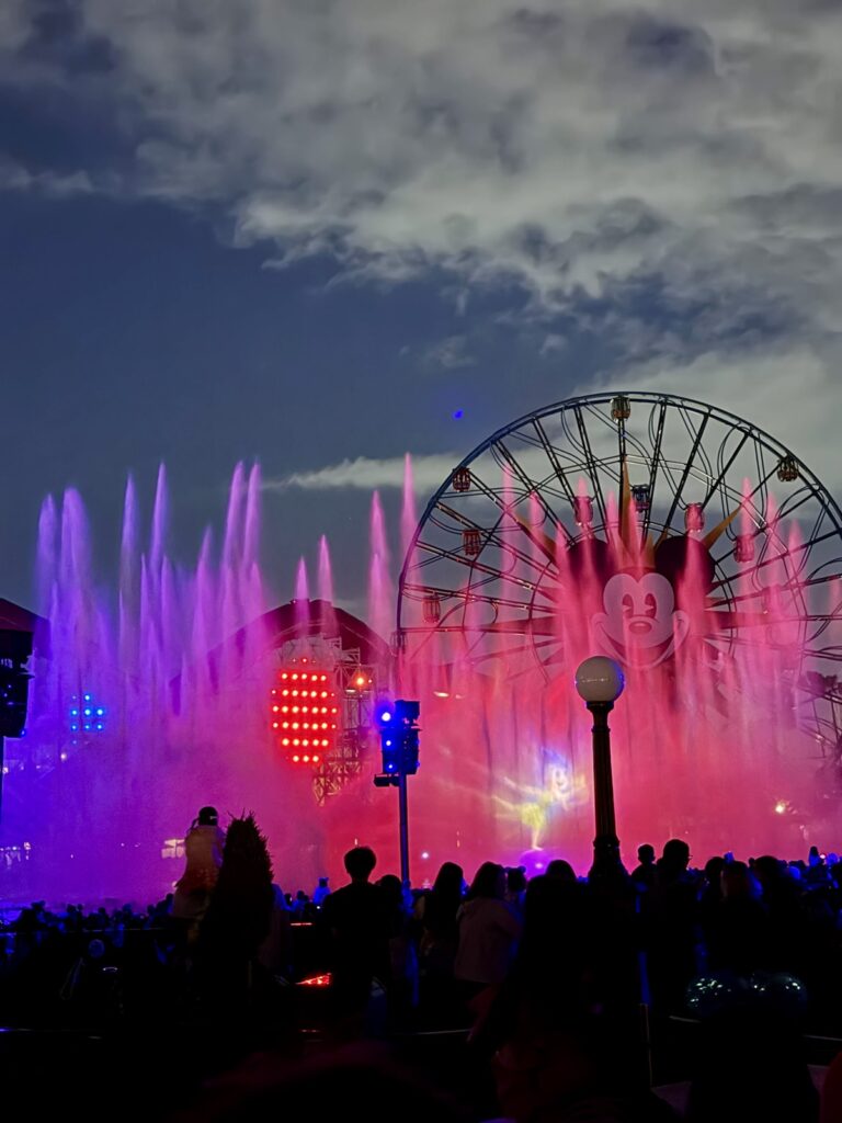 A picture of Disneyland's 70th Anniversary World of Color Happiness featuring Joy.