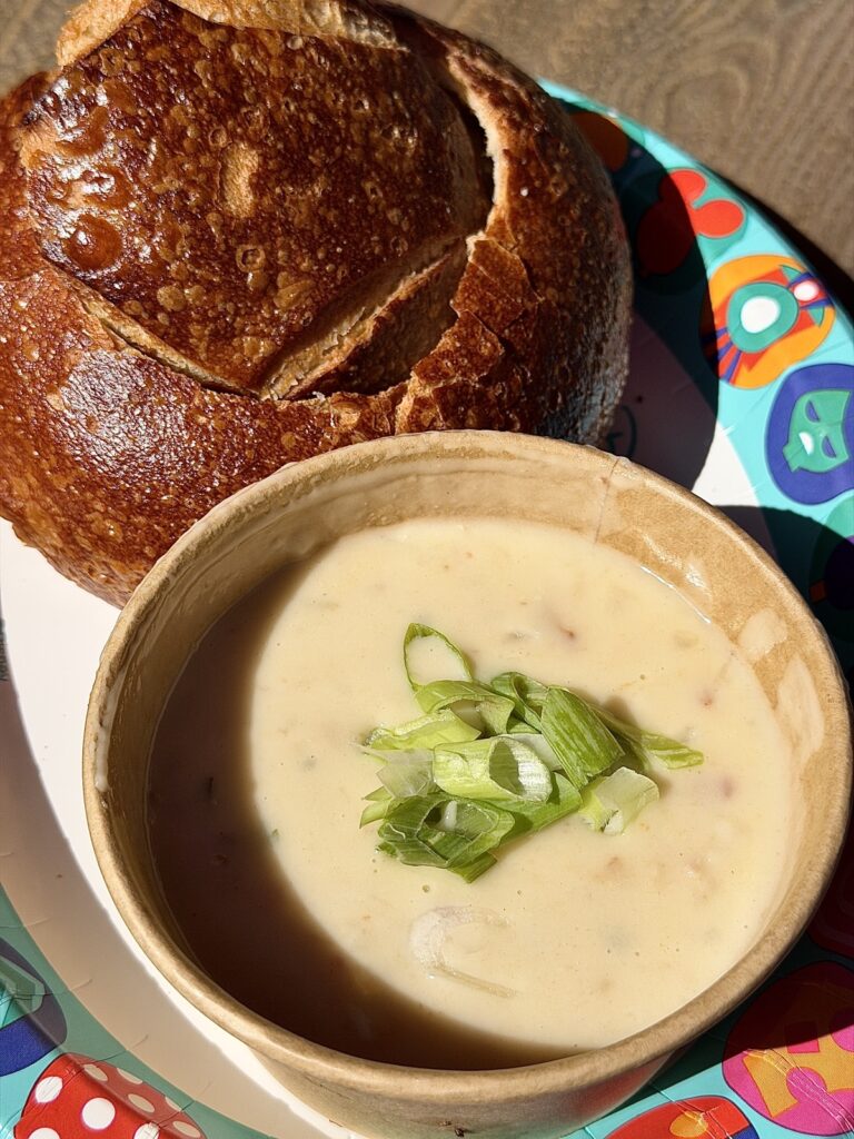 A picture of clam chowder and bread bowl from Aunt Cass in Disneyland, California Adventure.