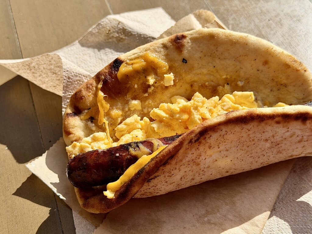 A picture of a breakfast Ronto Wrap side view from Ronto Roasters in Galaxy's Edge at Disneyland in Anaheim, California.