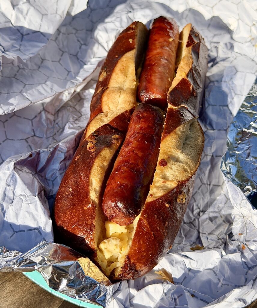 A picture of the cheesy pretzel bread with eggs and sausage from Maurice's Treats at Disneyland in Anaheim, California.